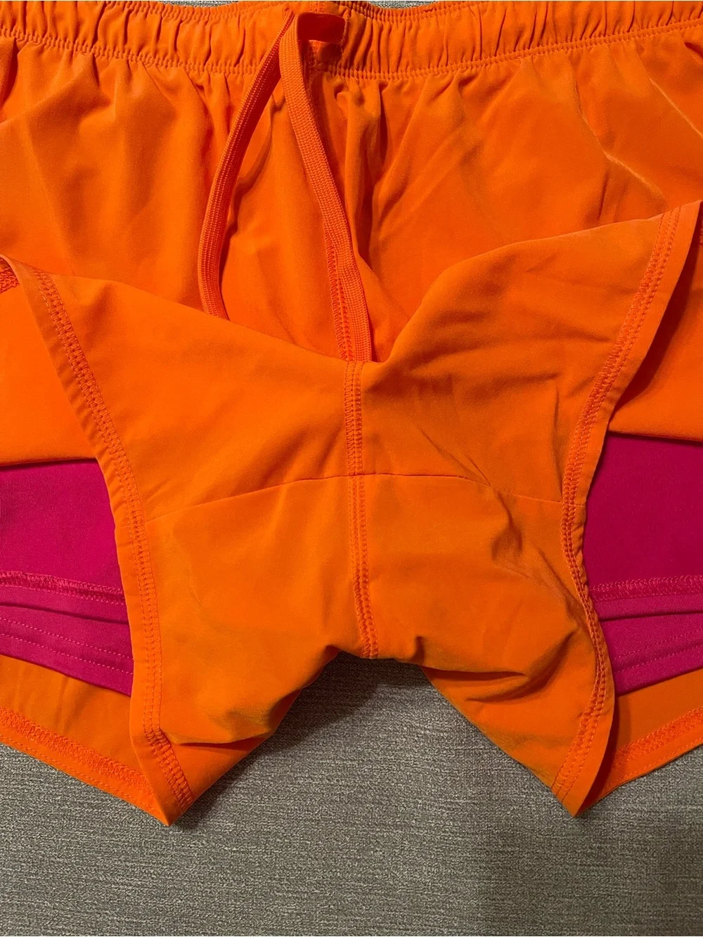 Nike Dri-FIT Women's Bright Orange Running Athletic Shorts with Pink Swoosh